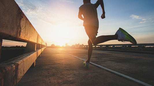 A person running on a sidewalk 