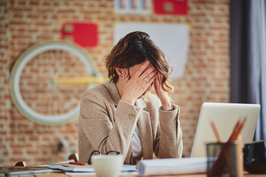 A woman with anxiety in an office